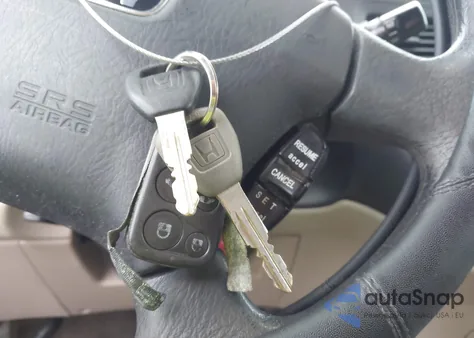 2002 Honda Odyssey Ex-L z USA, uszkodzony, nr VIN 5FNRL18942B011353